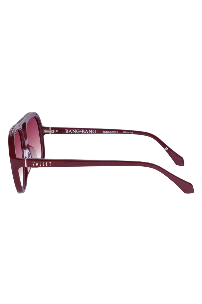Sunglasses with 'Bang Bang Valley' branding on a white background