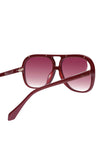 Red sunglasses with a gradient lens on a white background
