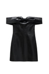 Black leather off-shoulder dress with a large bow on a white background