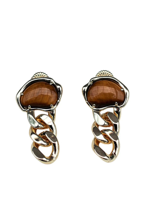 Gold earrings with brown gemstones on a white background