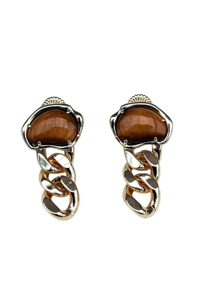 Gold earrings with brown gemstones on a white background