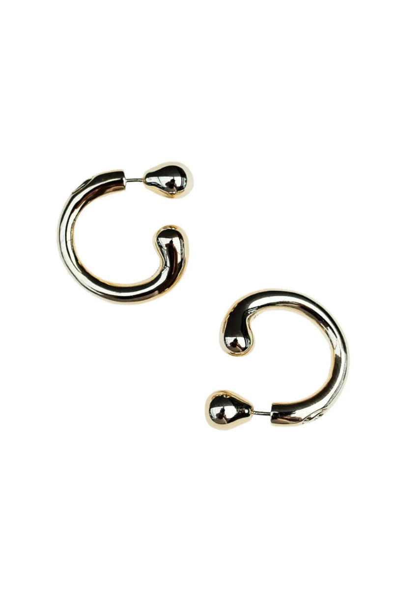 Gold hoop earrings on a white background