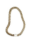 Gold chain necklace on a white background