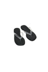 Black sandals with clear straps on a white background