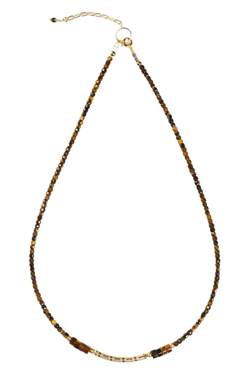 Necklace with brown and gold beads on a white background