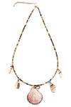 Necklace with shell and bead charms on a white background
