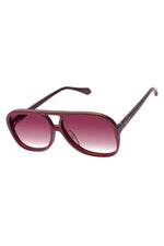 Aviator sunglasses with a gradient pink lens on a white background