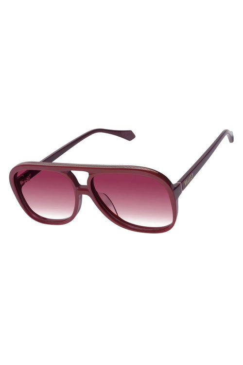 Aviator sunglasses with a gradient pink lens on a white background
