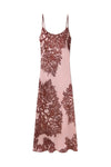 Pink slip dress with coral pattern on a white background