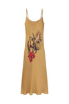 Mustard yellow slip dress with floral and animal print on a white background