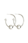 Silver hoop earrings with spherical ends on a white background