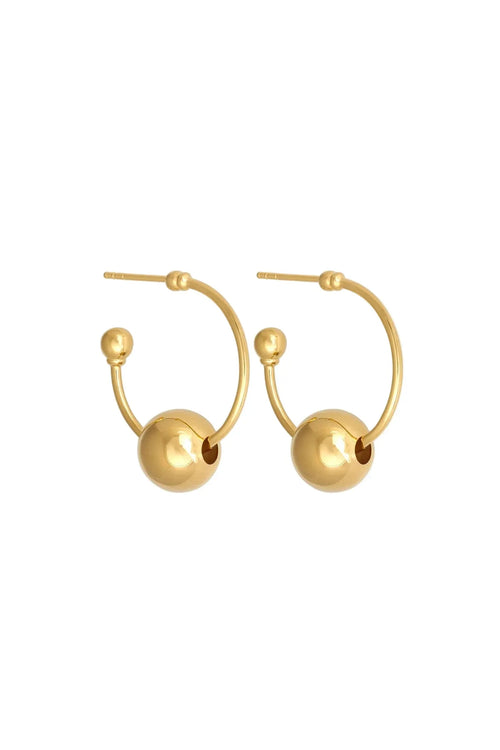 Gold hoop earrings with spherical ends on a white background