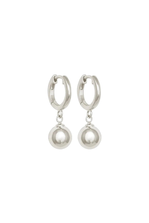 Silver hoop earrings with pearl-like drop charms on a white background