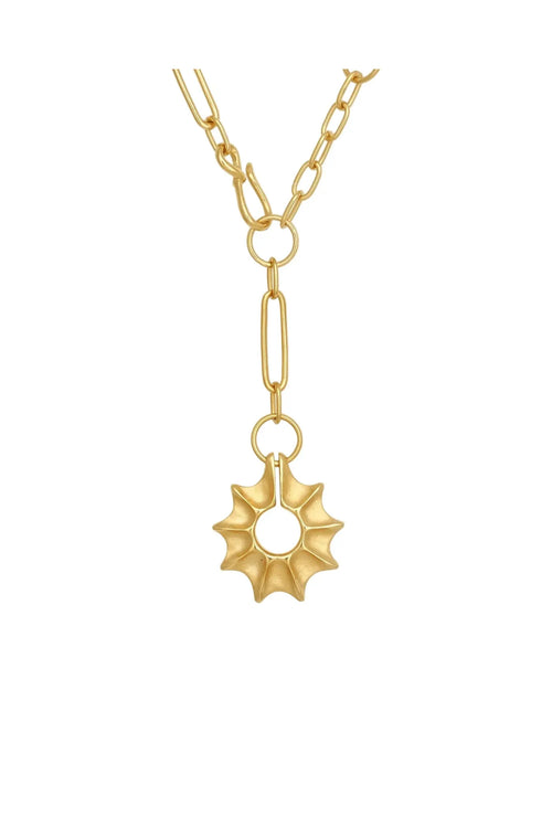Gold necklace with a star-shaped pendant on a white background