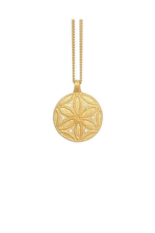 Gold necklace with a detailed pendant on a white background